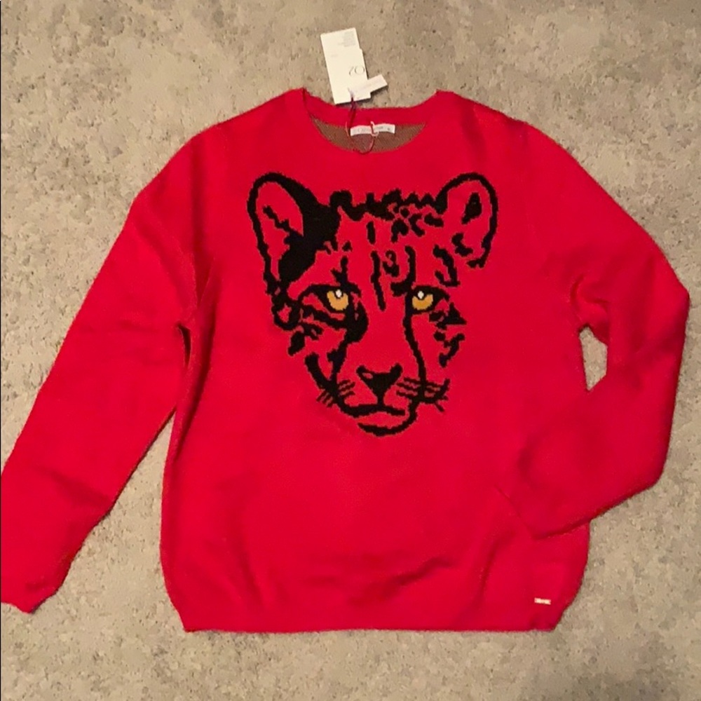 Q2 red leopard sweater size medium. New with tags.